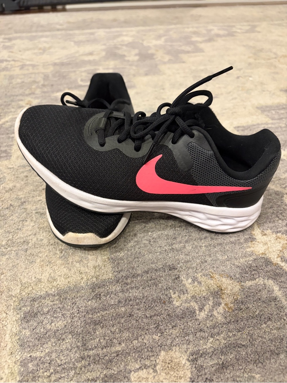 Nike Women's Black Running Sneakers with Pink Swoosh